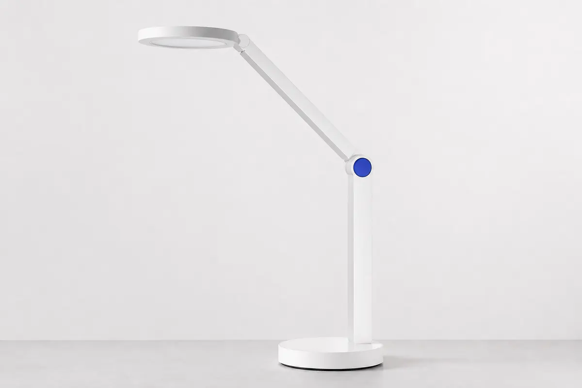 Minimal white desk lamp product photograph